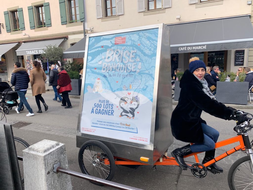 Vélo publicitaire 
agence de communication
streetmarketing Genève
Communication de proximité
Affiche mobile
Livraison